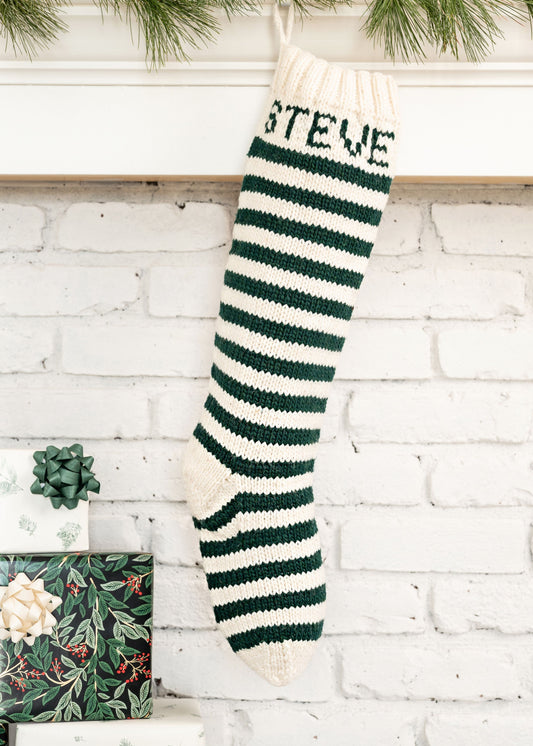Christmas Stocking knitting kit featuring a whte and green striped design